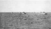 Tanks advancing across the 
desert, 19th December 1940 (Imperial War Museum)