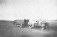 Desert near Wadi Derna 
(17th Brigade): Captured Italian trucks and trailers were used on the desert supply lines