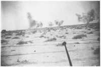 The German dive-bombing 
attack on the 2/24th Battalion’s positions before the enemy assault on 30th April-1st May 1941, as seen from a 
carrier of the 2/48th Battalion