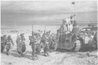 Men of the 19th New Zealand 
Battalion and a Matilda of the 4th Royal Tank Regiment at Ed Duda after the link-up