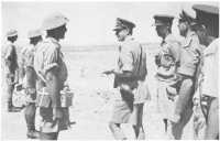 General Sir Harold 
Alexander, the new Commander-in-Chief, Middle East, meets officers of the 2/13th and 2/15th Battalions at 20th Brigade 
headquarters, 21st August 1942
