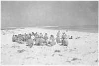 A church service in the 
sand dunes at El Alamein, September 1942