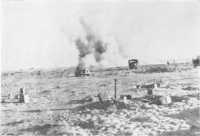 Positions of the 24th 
Brigade, west of Tel el Eisa, under enemy shell fire late in the afternoon of 1st November 1942 (Imperial War Museum)