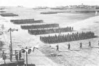 General Sir Harold 
Alexander took the salute as the men swung past the saluting base (Australian War Memorial)
