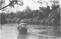 A river barge transporting 
stores and sick prisoners of war on the Menam Kwa Noi River, Thailand