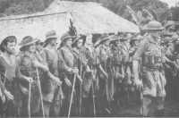A parade of the 39th 
Battalion at Menari, where they were addressed by their commanding officer, Lieut-Colonel R