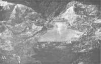 An aerial view of Wau 
airfield during the Japanese attack, January 1943