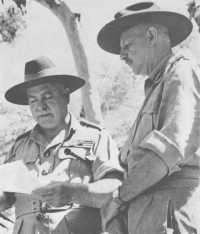 General Sir Thomas Blamey 
and Lieut-General Sir Iven Mackay at New Guinea Force headquarters
