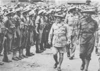 Inspecting the 25th Brigade 
at Port Moresby on 28th August 1943 before their departure for the Lac operation