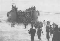 Men of the 2nd Field 
Regiment disembarking from an LCT at Toko on 20th March 1945
