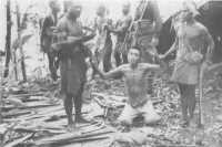 I loops of the New Guinea 
Infantry Battalion, attached to the 7th Brigade, with Japanese prisoners taken during a raid in the Barara area