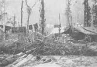 A sodden camp of the 47th 
Battalion in southern Bougainville on 20th July 1945