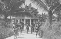 Troops of the 2/17th 
Battalion patrolling the town of Brunei