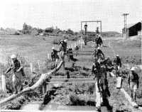 Basic Training in Canada 
Recruits on an obstacle course at Canadian Army (Basic) Training Centre No