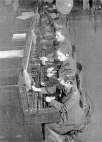 The Canadian Women’s 
Army Corps Overseas CWAC operators at work on the telephone switchboard at Canadian Military Headquarters, London, 
September 1941