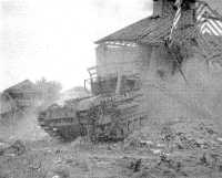 Training for the Dieppe 
Raid A Churchill tank of “A” Squadron 14th Army Tank Regiment (The Calgary Regiment) uses a bombed house to 
demonstrate its prowess during the training on the Isle of Wight, June 1942