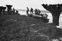 The Patricias Cross the 
Ijssel, Men of Princess Patricia’s Canadian Light Infantry landing from “Buffaloes” of the 79th 
Armoured Division in Operation CANNONSHOT, 11 April 1945