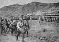 Italian prisoners of war 
march down from Toselli Fort to the bottom of Toselli pass at Enda Medani Alem