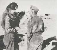 Brigadier Watkins of 1 Army 
Tank Brigade confers with Lieutenant-Colonel Gentry after a Stuka raid