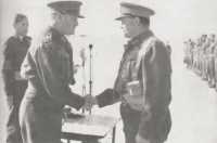 General Auchinleck 
congratulates General Freyberg after the campaign