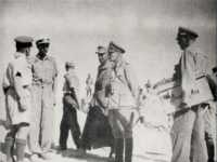 Rommel (centre) with staff, 
Brig Clifton (as prisoner) is on the left