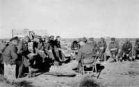 General Freyberg confers 
with his O Group near Nofilia