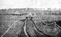 18 Regiment tanks pass 
through a minefield after the attack on 15–16 December 1943