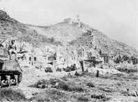 Tanks of 19 Armoured 
Regiment and British infantry enter Cassino, 18 May 1944