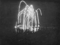 New Zealanders shoot off 
flares to celebrate the end of the war with Germany