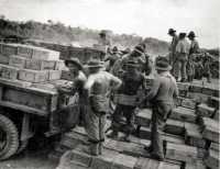 Loading rations at 
Guadalcanal for Vella Lavella