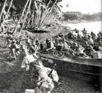 14 Brigade units landing at 
Vella Lavella from American barges manned by American Crews