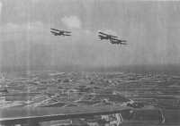 Albacores of the Fleet Air 
Arm over Malta; showing the many stone walls which cover the island