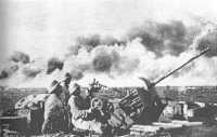 Photograph found in an 
enemy dug-out of German AA gunners in action; the gun is a 2-cm Flak