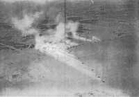 Boston bombers of the Royal 
Air Force take off from a desert airfield, leaving plumes of dust in their wake