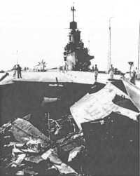 Operation PEDESTAL: HMS 
Indomitable hit by German dive-bombers, 12th August 1942