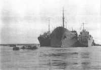 Operation PEDESTAL: the 
damaged tanker Ohio being nursed into harbour by two destroyers