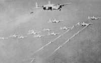 D-Day for Green Islands: 
B-25’s en route to Kabaul Pass Invasion Fleet
