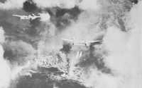 P-38’s Droping 
Napalm Near Ipo Dam