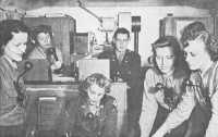 Air Wacs with Eighth Air 
Force in England – In mobile control unit truck