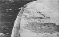Aerial Reconnaissance 
photograph of beach defenses