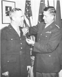 General Crawford receiving 
the Distinguished Service Medal from General Devers