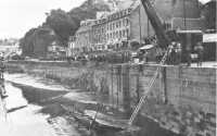 Crane lifting a lock gate 
from the water at Morlaix, 23 August 1944