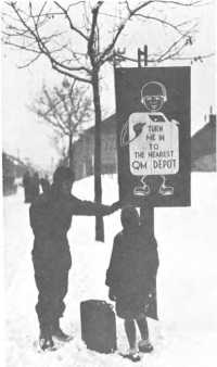 Sign appealing for the 
return of jerricans posted along a street in Charleroi, Belgium