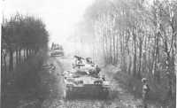 M24 light tanks with the 
75-mm