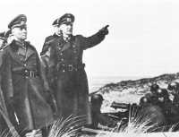 Field Marshal Rommel (left) 
inspecting coastal defenses