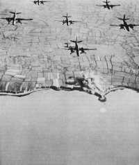 Pre-invasion bombing of 
Pointe du Hoc by Ninth Air Force bombers