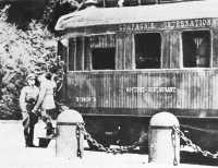 Hitler leaving railway 
carriage at Compiègne where the Germans dictated the 1940 peace terms to the French nation