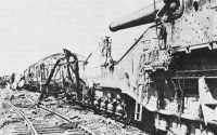 Wreckage of military 
train after aerial strafing attack