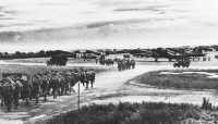 Parachute Troops marching 
onto airfield on evening of 5 June