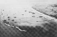 Aerial view of beach 
showing breakwater of sunken ships